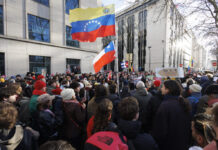 Protesters in Brussels Condemn US Actions and Maduro Abduction Protesters gather outside the US Embassy in Brussels, waving banners and chanting slogans against American intervention in Venezuela