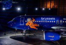 Brussels Airlines unveils new Tintin aircraft celebrating Belgian comic heritage Tintin-themed Airbus A320 displays moon rocket artwork and comic characters during inaugural Brussels Airlines presentation at Brussels Airport